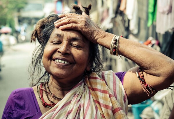 Woman with Arm on Head, Smiling